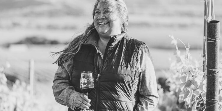 Native American winemaker Tara Gomez with glass in hand