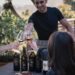 Malek Amrani, winemaker toasting with guests