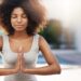 A woman practicing mindfulness meditation to regulate her parasympathetic nervous system.