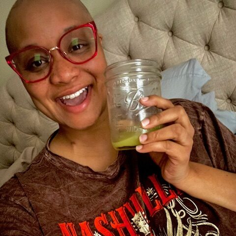 Meaghan Odum holding green juice