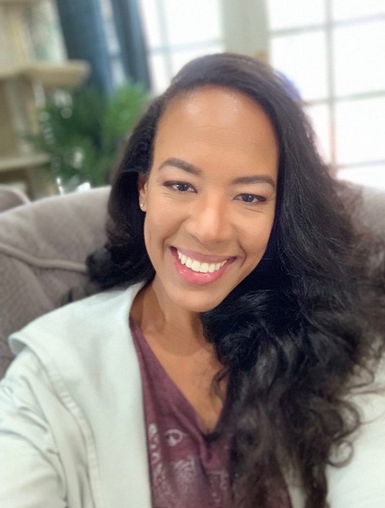 Jamie Fowler, therapist at Shades of Healing in Los Angeles, smiling warmly in a bright, calming space.