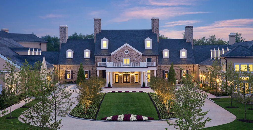 Luxury estate-style exterior of Salamander Resort & Spa at dusk.