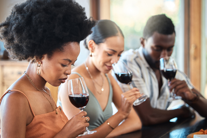 Intimate luxury wine tasting experience with diverse friends showcasing personalized attention and curated wine selections.