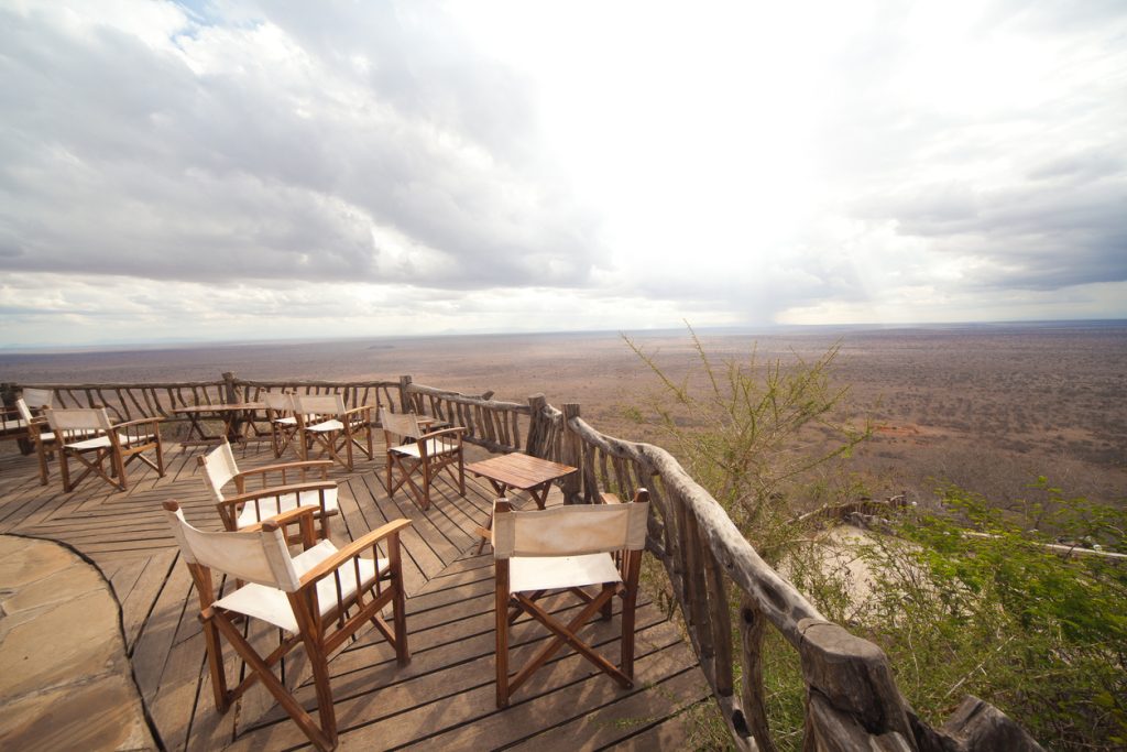 Lions Bluff Lodge view overlooking the vast savannah landscape in Lumo Conservancy, Kenya.